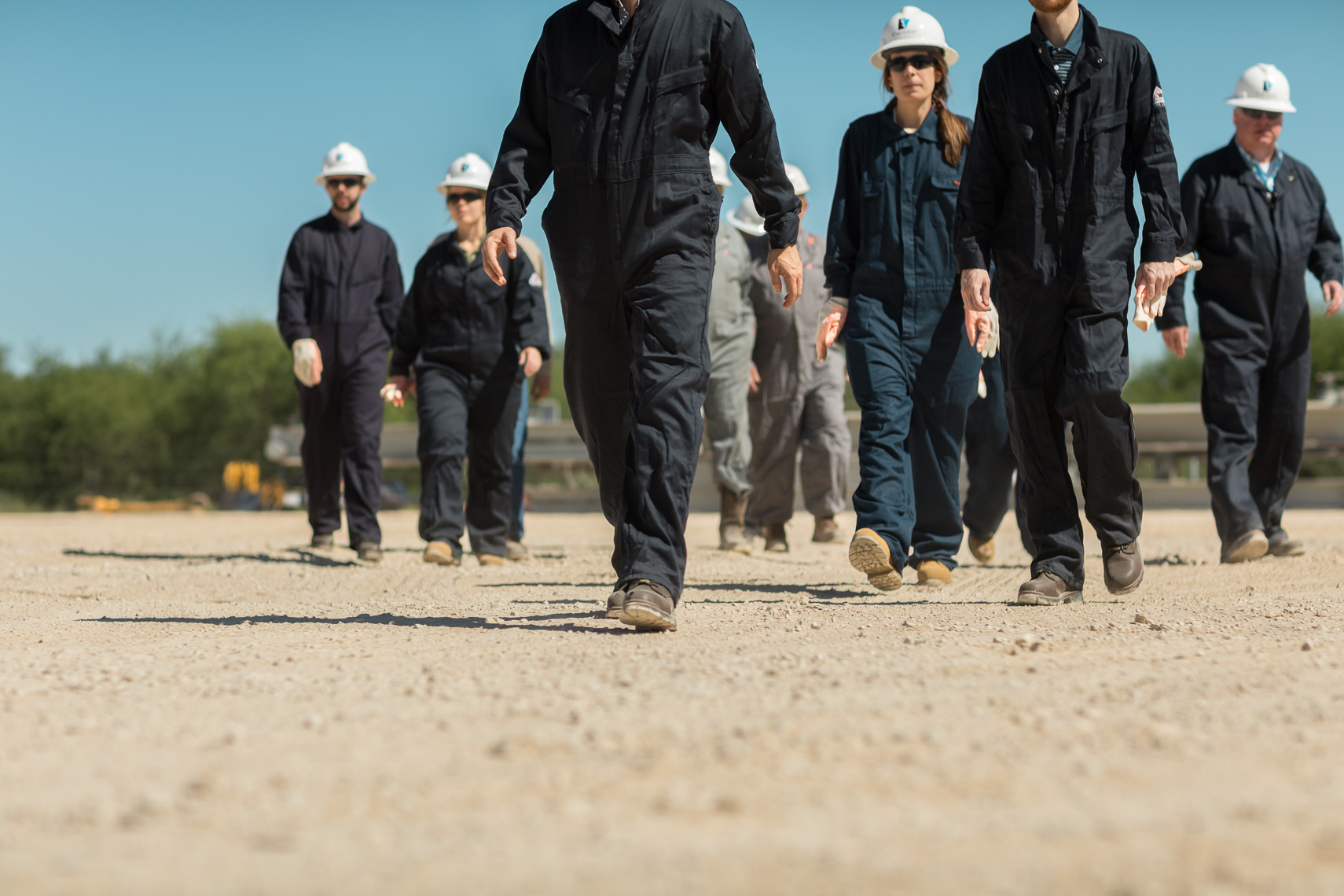 Group Of Oil & Gas Site Visitors Walking - Photo By Jason Risner