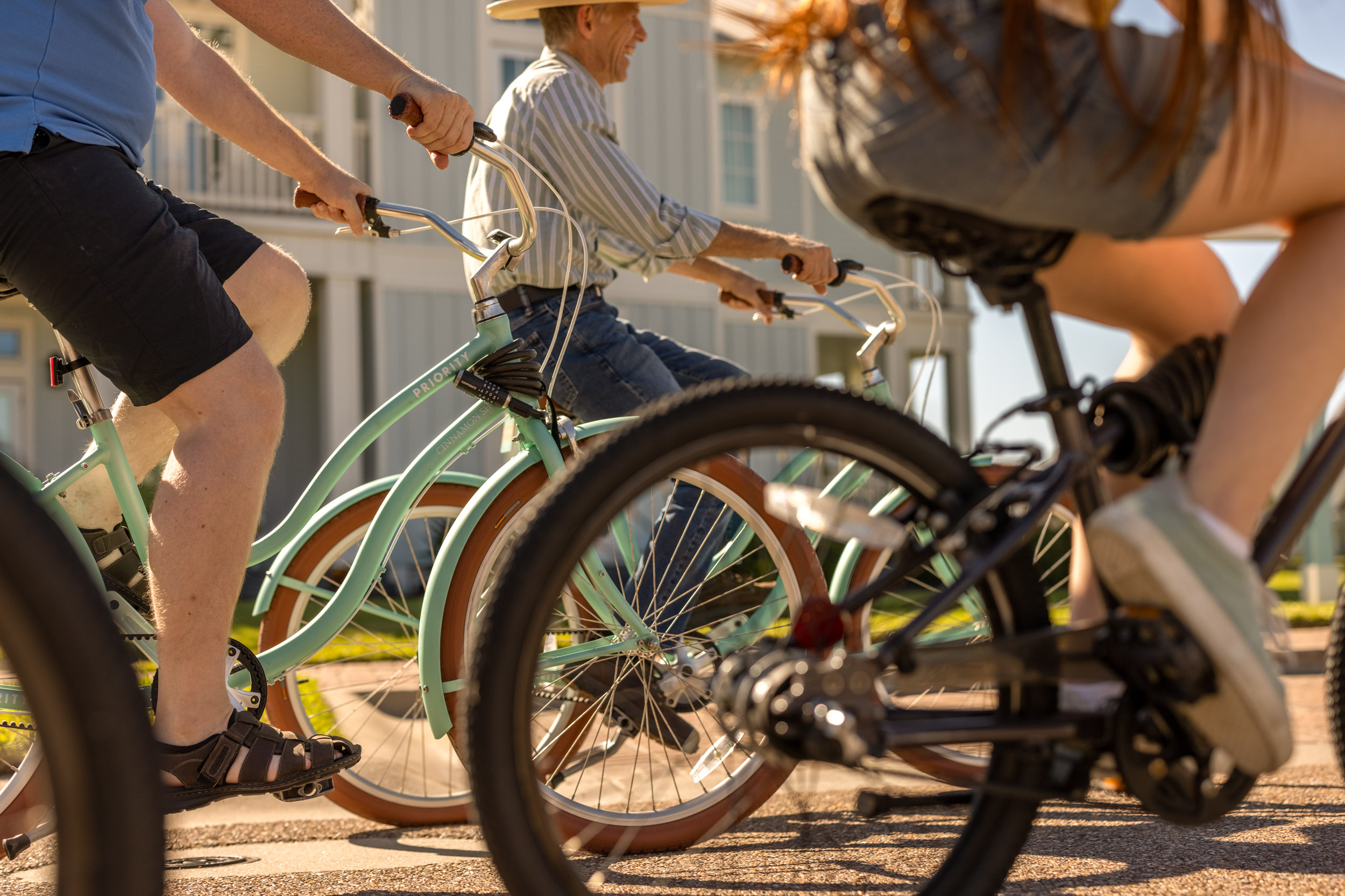 family riding bicycles at cinnamon shore in port aransas